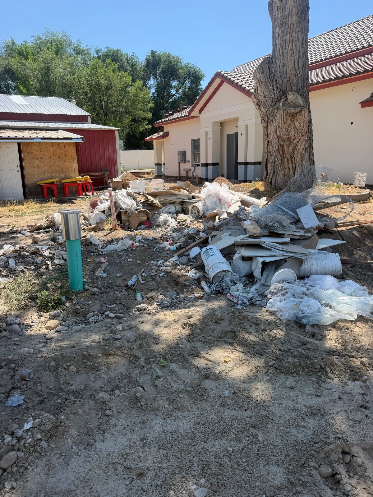 Construction site with scattered debris and building materials